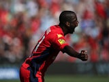 Adelaide United's Bruce Djite celebrates after scoring the opening goal against Newcastle Jets during their A-League match on December 29, 2013