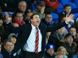 Malky Mackay, manager of Cardiff City shows his frustration during the Barclays Premier League match between Cardiff City and Southampton at Cardiff City Stadium on December 26, 2013