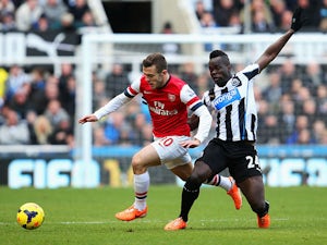 Wilshere lauds Arsenal defence