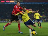 Craig Noone of Cardiff City challenges Andrea Dossena of Sunderland during the Barclays Premier League match on December 28, 2013