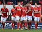 Charlton's Dale Stephens celebrates with teammates after scoring the opening goal against Sheffield Wednesday during their Championship match on December 29, 2013