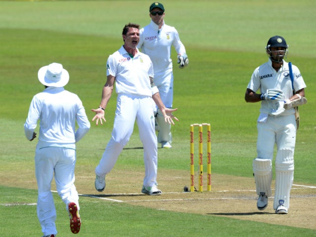 Dale Steyn of South Africa celebrates the wicket of Murali Vijay of India for 97 runs during day 2 of the 2nd Test match between South Africa and India at Sahara Stadium Kingsmead on December 27, 2013