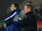 Cardiff City caretaker manager David Kerslake and Sunderland manager Gus Poyet look on during the Barclays Premier League match on December 28, 2013