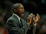 Head coach Dwane Casey of the Toronto Raptors encourages his team against the Chicago Bulls at the United Center on December 14, 2013
