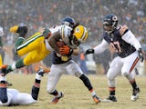 Running back Eddie Lacy of the Green Bay Packers carries the ball in the first quarter against the Chicago Bears during a game at Soldier Field on December 29, 2013
