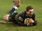 George North of Northampton dives over for the final try during the Aviva Premiership match between Northampton Saints and Bath at Franklin's Gardens on