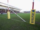 The crossbar on the post lies on the ground, after being damaged during the pre match entertainment during the Aviva Premiership match between Gloucester and Worcester Warriors at Kingsholm Stadium on December 22, 2013