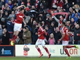 Forest's Greg Halford celebrates with teammates after scoring the opening goal against Leeds during their Championship match on December 29, 2013