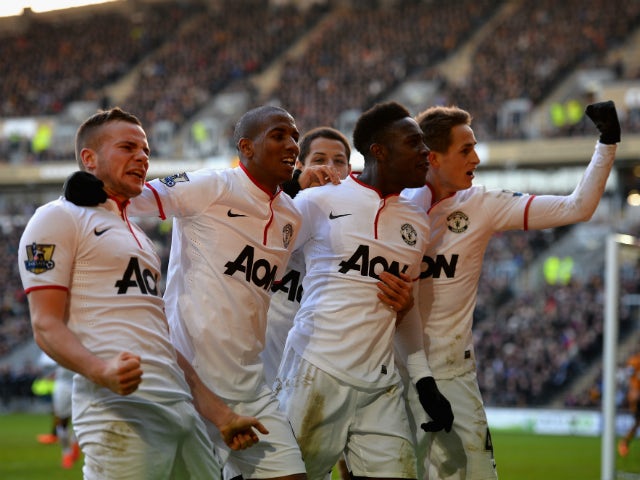 Tom Cleverley, Ashley Young, Danny Welbeck and Adnan Januzaj of Manchestere United celebrate the third goal during the Barclays Premier League match between Hull City and Manchester United at KC Stadium on December 26, 2013 