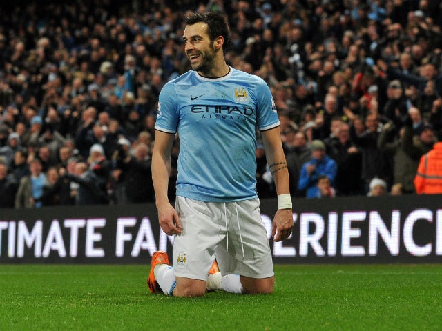 Manchester City's Spanish striker Alvaro Negredo celebrates scoring a goal during the English Premier League football match between Manchester City and Liverpool at Etihad Stadium in Manchester, northwest England on December 26, 2013