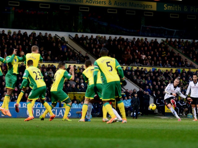 Pajtim Kasami of Fulham shoots from a free kick to score their first goal during the Barclays Premier League match between Norwich City and Fulham at Carrow Road on December 26, 2013