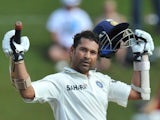 Indian batsman Sachin Tendulkar celebrates scoring a century against South Africa on December 19, 2010.