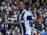 West Bromwich Albion's Burundian striker Saido Berahino cerebrates scoring their third goal during the English Premier League football match against West Ham United on December 28, 2013