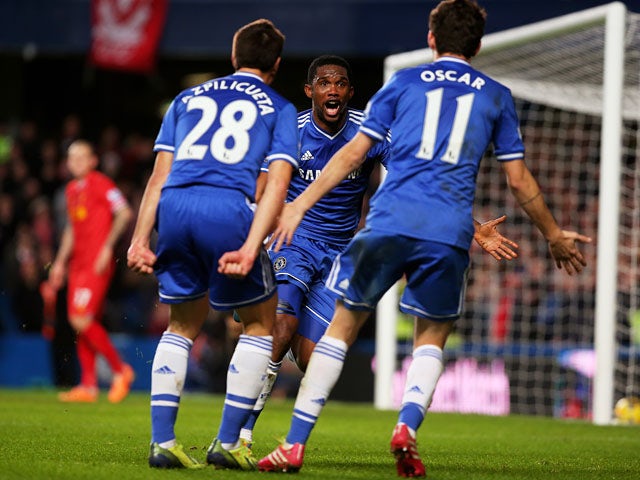 Chelsea's Samuel Eto'o celebrates after scoring his team's second goal against Liverpool during their Premier League match on December 29, 2013