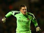Vito Mannone of Sunderland celebrates victory during the Capital One Cup Quarter-Final match between Sunderland and Chelsea at Stadium of Light on December 17, 2013