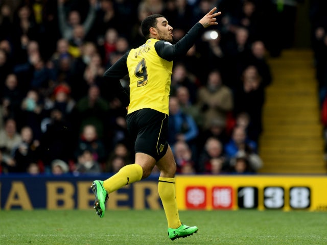 Troy Deeney of Watford celebrates scoring during the Sky Bet Championship match between Watford and Millwall at Vicarage Road on December 26, 2013
