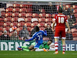 Hull's Aaron Mclean scores the opening goal against Middlesbrough during their FA Cup third round match on January 4, 2013