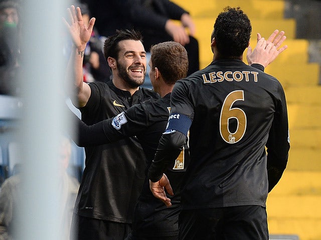 Man City's Alvaro Negredo is congratulated by teammates after scoring the opening goal against Blackburn during their FA Cup third round match on January 4, 2013