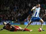 Brighton's Andrew Crofts and Reading's Danny Guthrie in action during their FA Cup third round match on January 4, 2013
