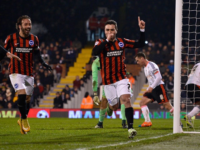 Adrian Colunga of Brighton celebrates scoring the first goal during the Sky Bet Championship match between Fulham and Brighton & Hove Albion at Craven Cottage on December 29, 2014