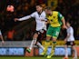 Fulham's Clint Dempsey and Norwich's David Fox battle for the ball during their FA Cup third round match on January 4, 2013