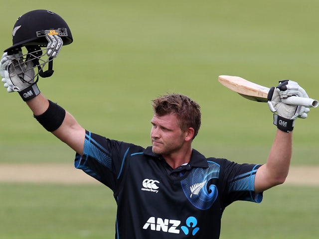 Corey Anderson of New Zealand celebrates scoring the fastest 100 runs in history during game three of the One Day International Series between New Zealand and the West Indies at Queenstown Events Centre on January 1, 2014