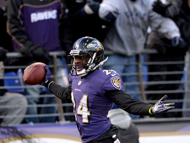 Cornerback Corey Graham #24 of the Baltimore Ravens after making an interception against the New York Jets in the fourth quarter at M&T Bank Stadium on November 24, 2013