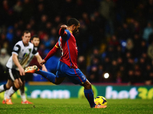 Jason Puncheon of Crystal Palace scores from the penalty box during the Barclays Premier League match between Crystal Palace and Norwich City at Selhurst Park on January 1, 2014