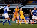 Ipswich's David McGoldrick scores the opening goal against Preston during their FA Cup third round match on January 4, 2013