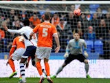 Bolton's David Ngog scores the opening goal against Blackpool during their FA Cup third round match on January 4, 2013