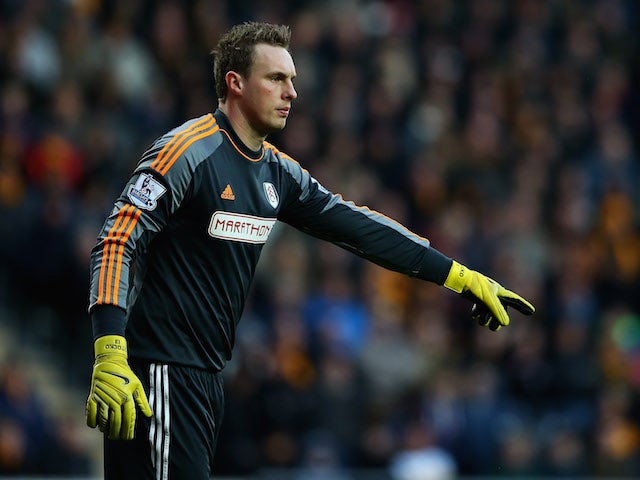 David Stockdale of Fulham in action during the Barclays Premier League match between Hull City and Fulham at KC Stadium on December 28, 2013 