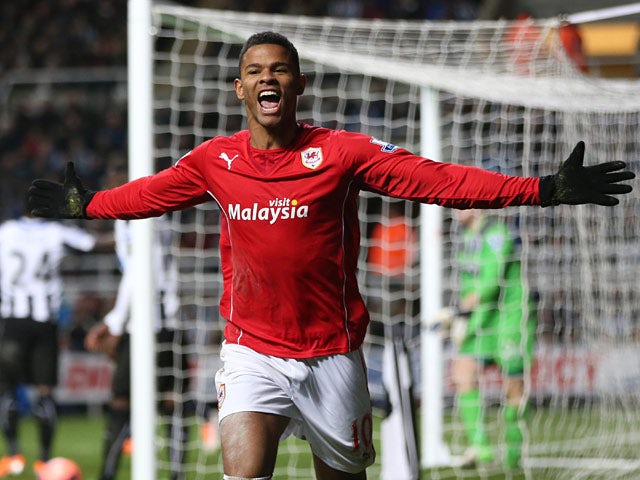 Cardiff's Fraizer Campbell celebrates after scoring his team's second goal against Newcastle during their FA Cup third round match on January 4, 2013
