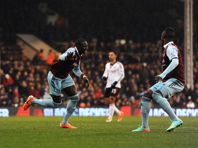 Mohamed Diame of West Ham celebrates after scoring the opening goal during the Barclays Premier League match between Fulham and West Ham United at Craven Cottage on January 1, 2014