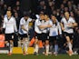 Steve Sidwell of Fulham is kissed by teammate Adel Taarabt after scoring a goal to level the scores at 1-1 during the Barclays Premier League match between Fulham and West Ham United at Craven Cottage on January 1, 2014