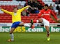 Barnsley's Jacob Mellis and Coventry's Peter Ramage battle for the ball during their FA Cup third round match on January 4, 2013