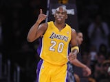 Los Angeles Laker's Jodie Meeks reacts after sinking a basket against the Minnesota Timberwolves at Staples Center on December 20, 2013
