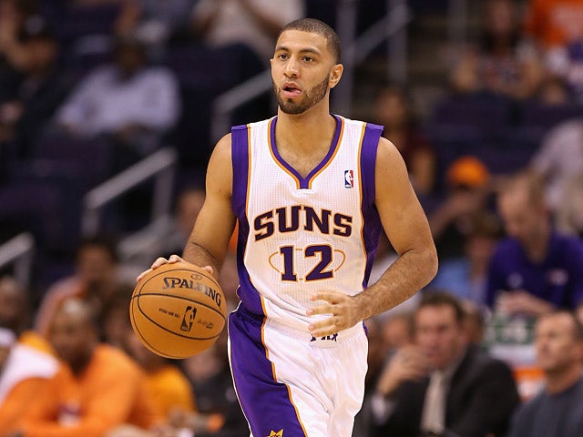 Phoenix Suns' Kendall Marshall in action against Portland Trail Blazers on October 12, 2012