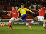 Coventry's Leon Clarke scores his team's second goal against Barnsley during their FA Cup third round match on January 4, 2013