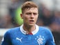 Lewis MacLeod of Rangers looks on during the pre season friendly match between Derby County and Rangers at iPro Stadium on August 2, 2014