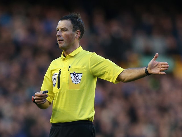 Referee Mark Clattenburg looks on during the Barclays Premier League match between Everton and Southampton at Goodison Park on December 29, 2013