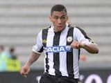 Udinese's Mathias Ranegie in action against Cagliari during their Serie A match on October 6, 2013