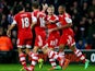 Southampton's Nathaniel Clyne celebrates with teammates after scoring the opening goal against Burnley during their FA Cup third round match on January 4, 2013