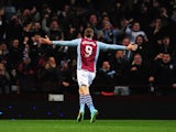 Aston Villa's Nicklas Helenius celebrates after scoring his team's first goal against Sheffield United during their FA Cup third round match on January 4, 2013