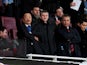 Molde manager Ole Gunnar Solskjaer and Cardiff City owner Vincent Tan look on from the stands prior to the Barclays Premier League match between Arsenal and Cardiff City at Emirates Stadium on January 1, 2014