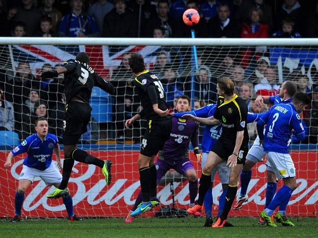 Sheffield Wednesday's Reda Johnson scores the opening goal against Macclesfield during their FA Cup third round match on January 4, 2013