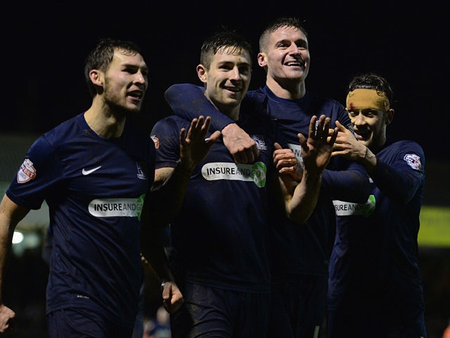 Southend's Ryan Leonard celebrates with teammates after scoring his team's fourth goal against Millwall during their FA Cup third round match on January 4, 2013