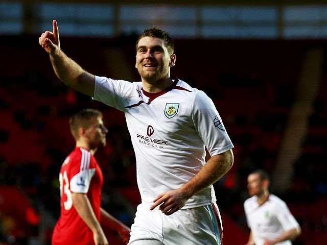 Burnley's Sam Vokes celebrates after scoring his team's first goal against Southampton during their FA Cup third round match on January 4, 2013