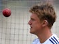 England spinner Scott Borthwick tosses the ball up during a training session at the Melbourne Cricket Ground (MCG), in Melbourne on December 25, 2013