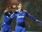 Oscar of Chelsea celebrates with teammate Ramires after scoring his team's third goal during the Barclays Premier League match between Southampton and Chelsea at St Mary's Stadium on January 1, 2014