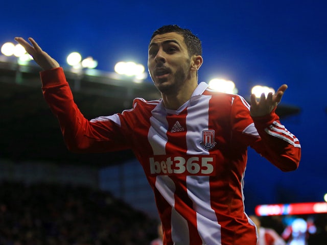 Oussama Assaidi of Stoke City celebrates scoring the opening goal during the Barclays Premier League match between Stoke City and Everton at Britannia Stadium on January 1, 2014